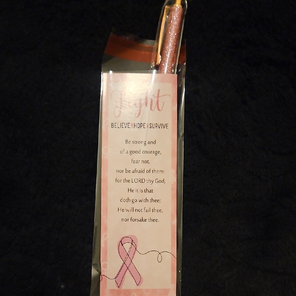 This is a set of 40 pink ribbon breast cancer awareness pens and bookmarks. 
